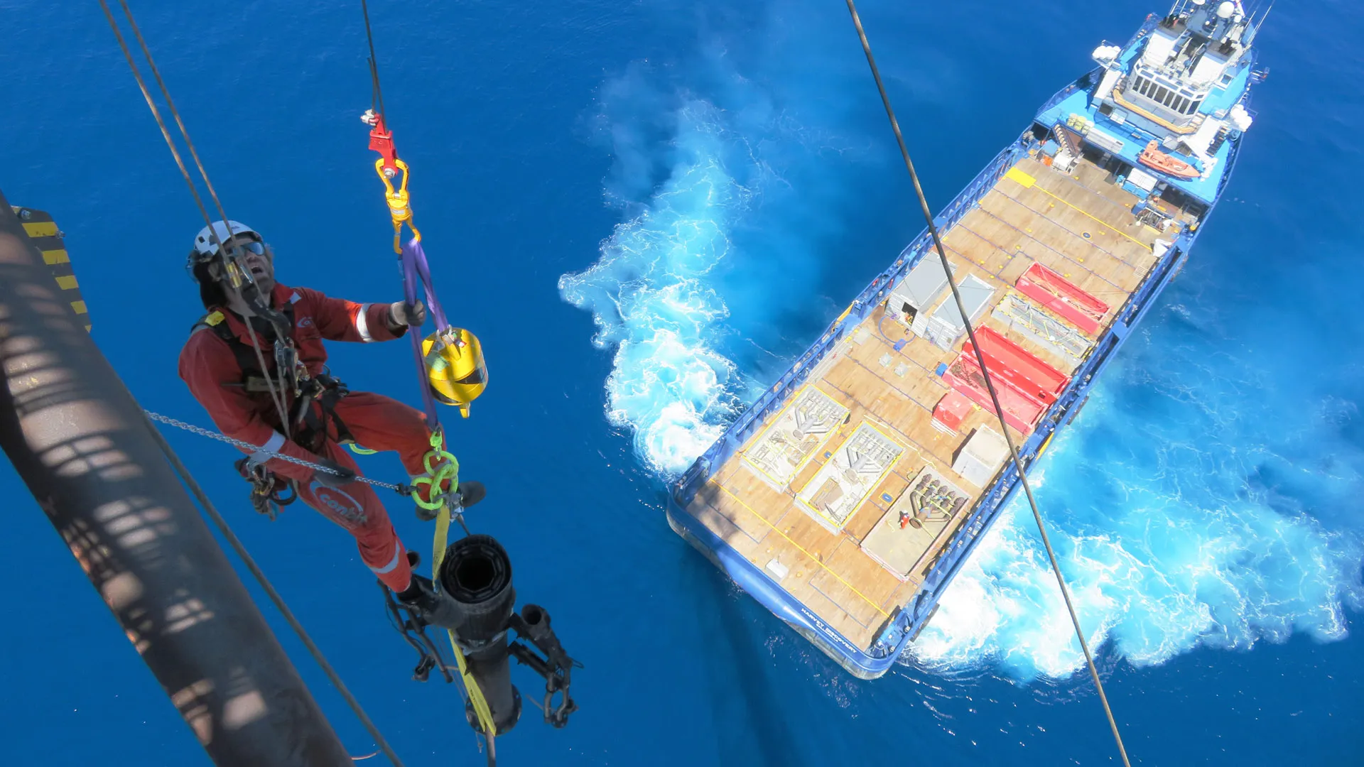 Conbit rope access technician working on flare tip replacement