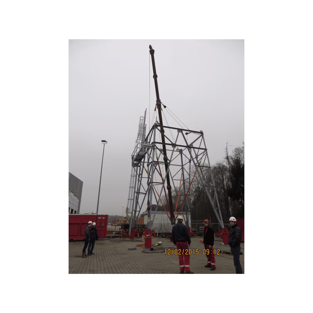 Conbit conducting a load test on the floating gin pole, ensuring safety and efficiency for offshore tower disassembly, combining lifting gantries and rope access techniques.