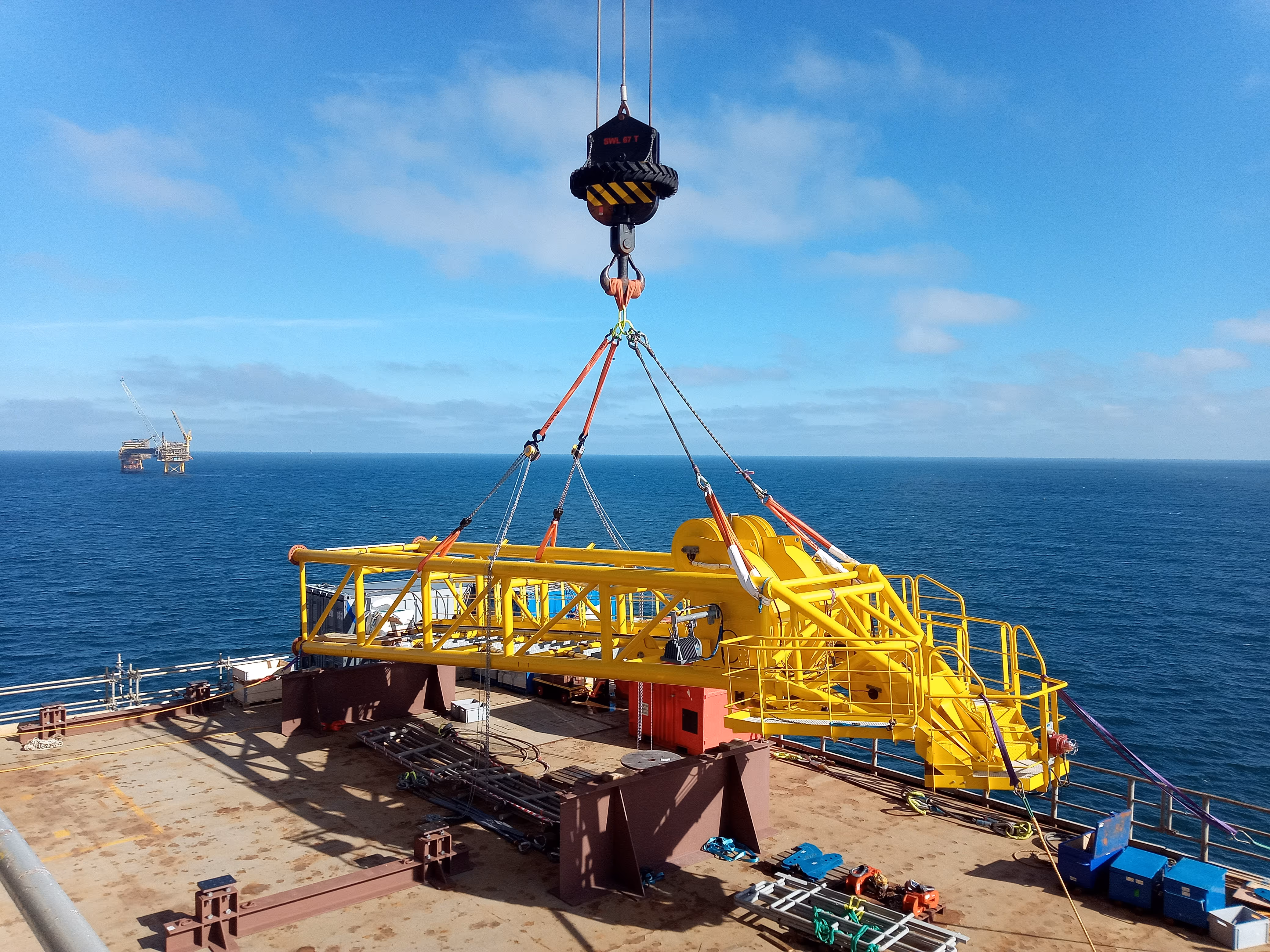 Hauling new crane component to its final location