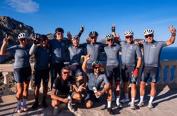 group pose of cyclists