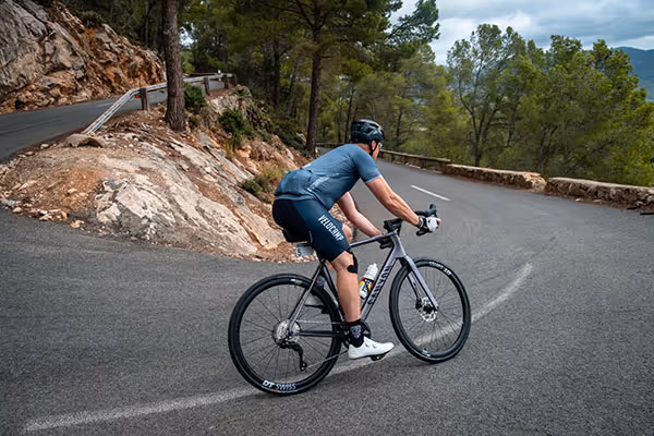 man descending on bike