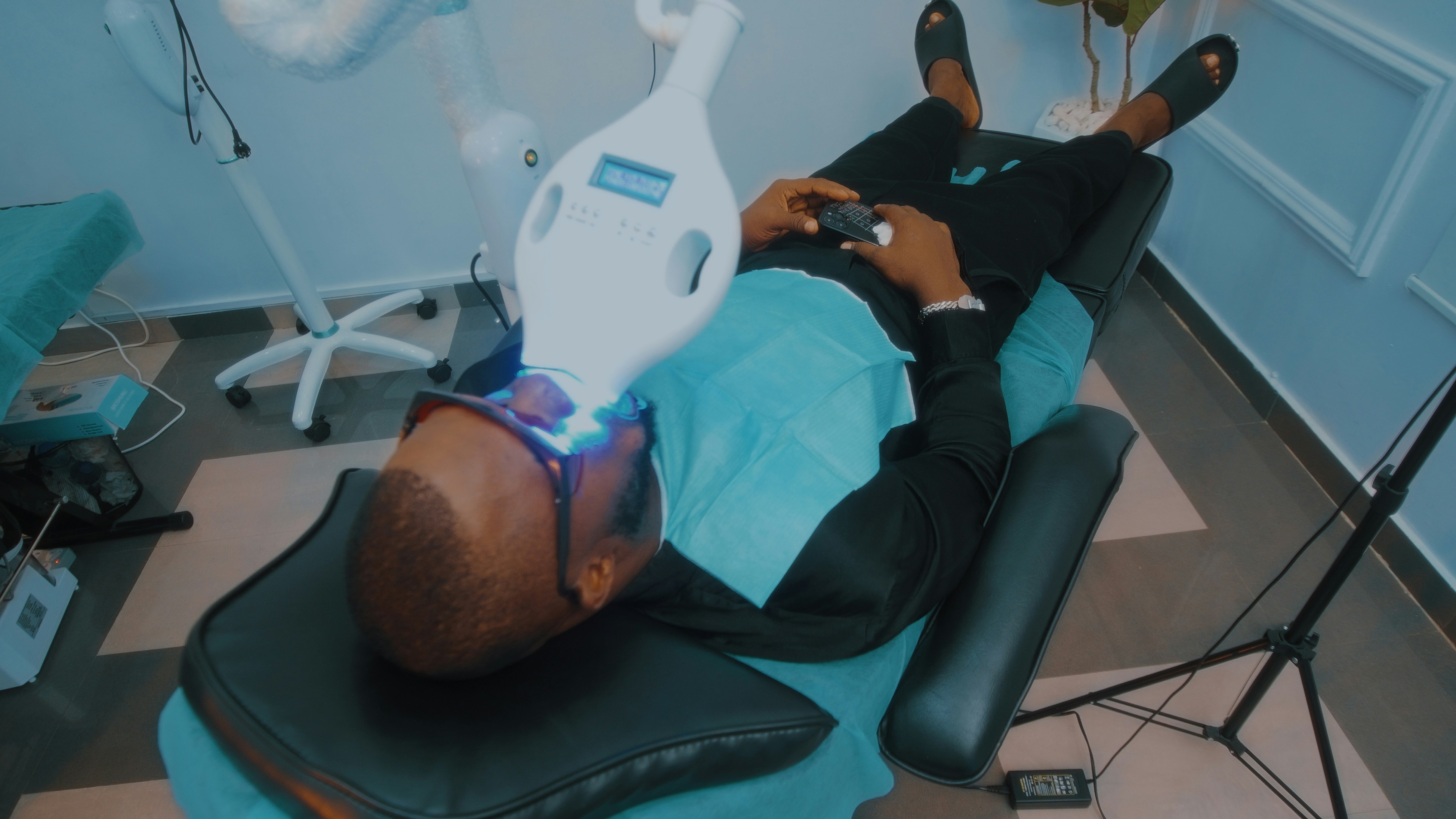 a person getting tooth whitening treatment