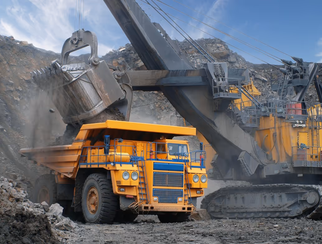 Massive cable shovel loading mining truck for heavy-duty commercial excavation support services