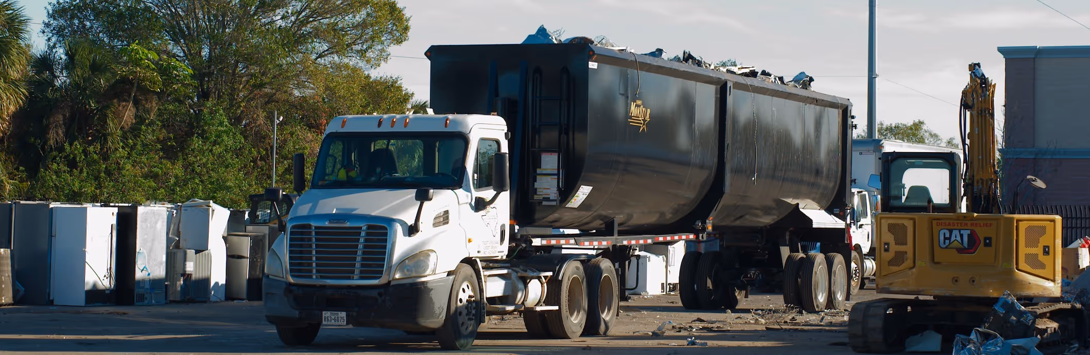Commercial truck for waste and hazardous material hauling services