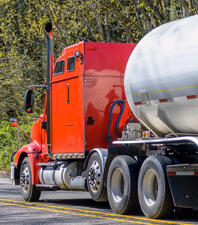 Commercial hazardous waste tanker truck for industrial liquid waste removal and disposal services