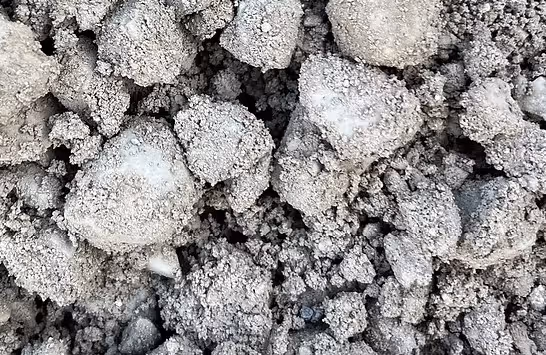 Mixed road base aggregate for foundation construction and bulk hauling services