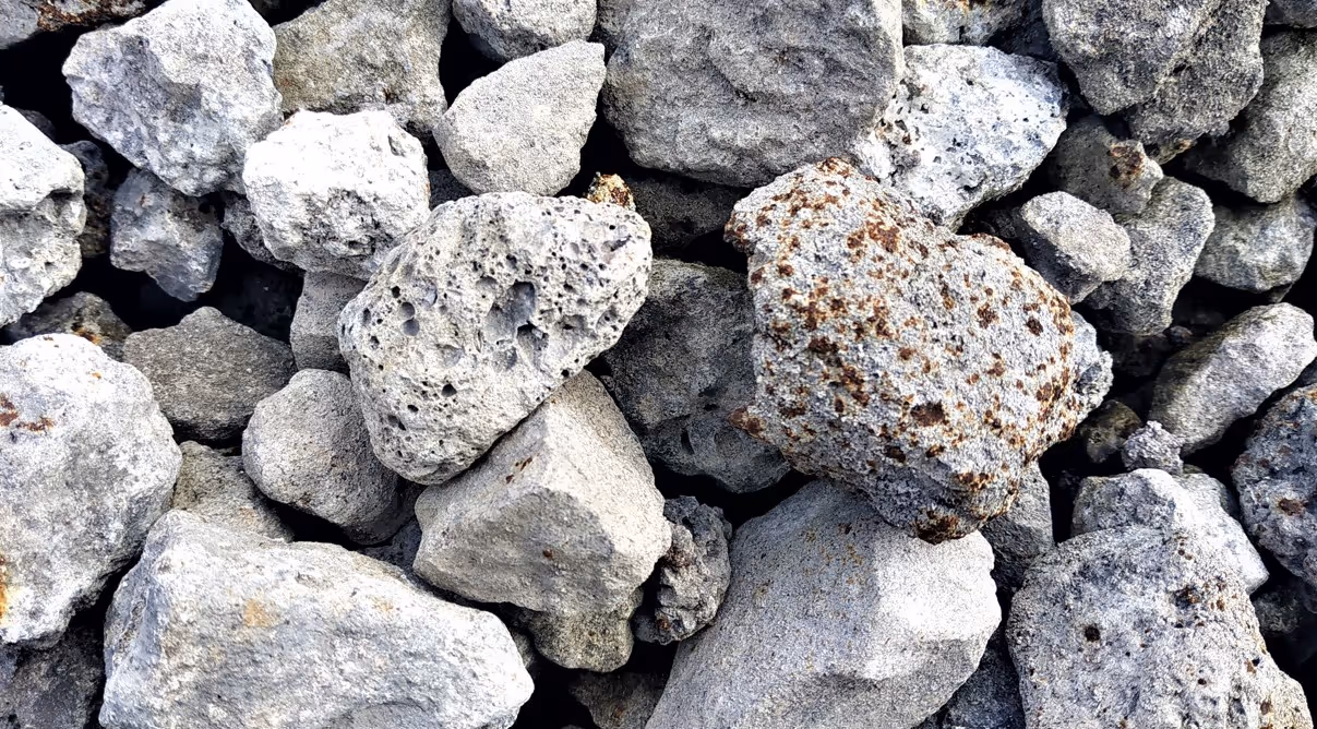 Porous steel slag aggregate for road construction and bulk recycling transport