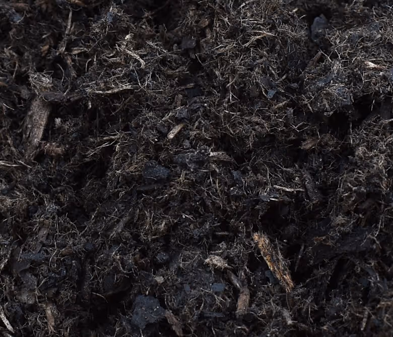Black biochar soil amendment for carbon sequestration and agricultural hauling