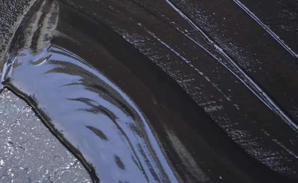 Hot pour crack sealant used for pavement repair in commercial road maintenance applications