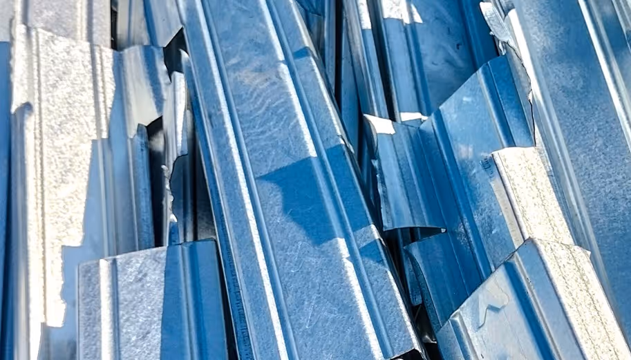 Metal roofing panels scrap for construction debris recycling and bulk hauling services