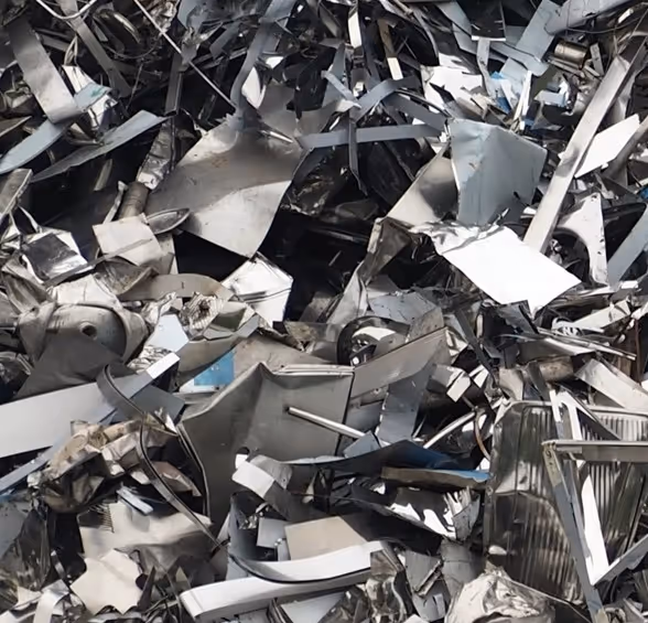 Shredded scrap metal pieces for construction recycling and bulk waste hauling services