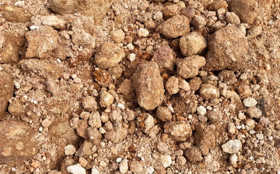 Mixed aggregate foundation support material for structural base and bulk earthwork delivery