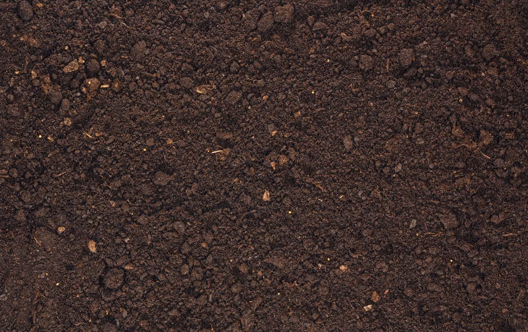 Rich organic planting soil mix for landscape installation and bulk garden bed delivery