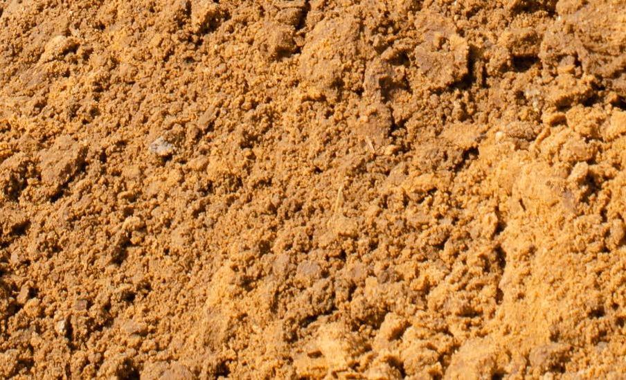 Loose excavated soil and earth materials from mass grading operations requiring excavation support services