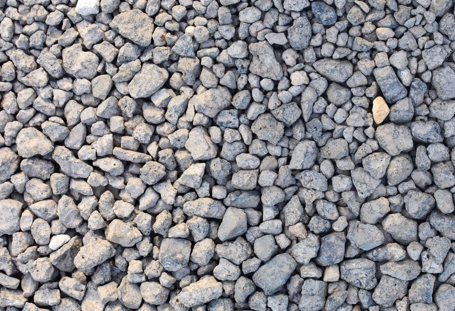 Industrial slag aggregate and furnace byproduct material requiring specialized recycling material hauling services