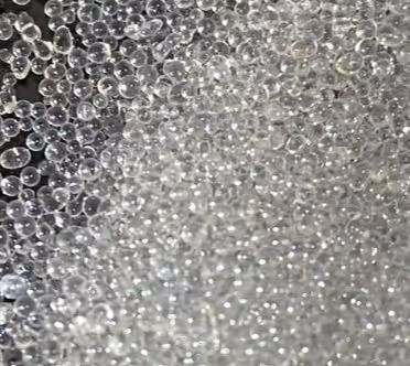 Clear glass beads for reflective road markings and commercial traffic marking material hauling