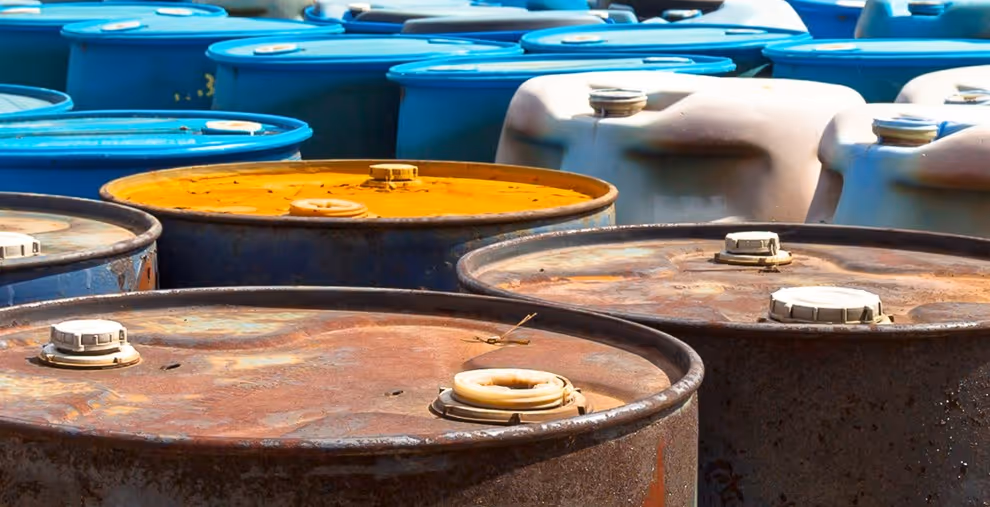 Mixed chemical waste drums for industrial disposal and commercial hazardous material hauling services