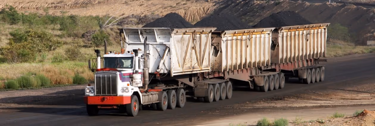White triple transfer train for ultra-high volume commercial hauling and massive construction material transport