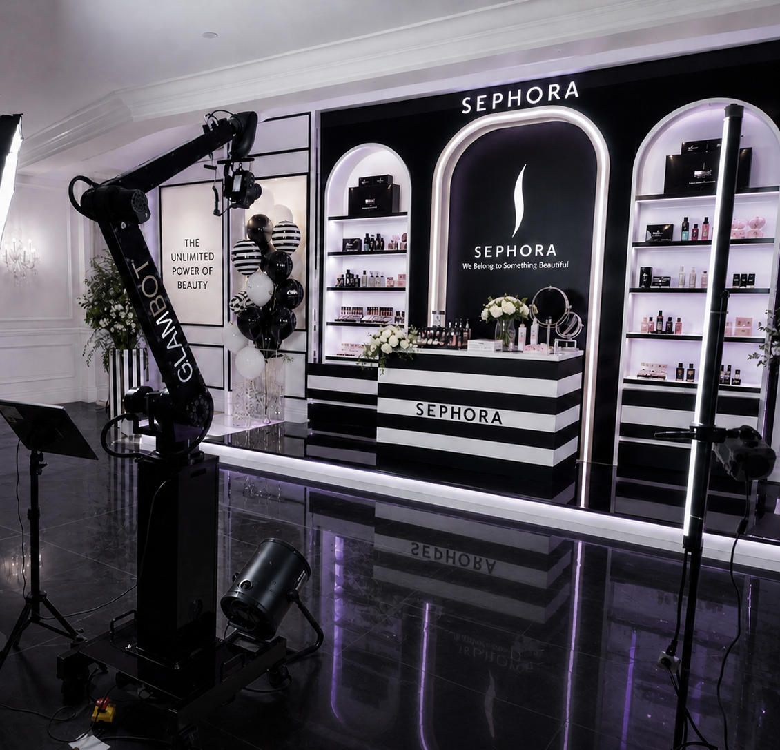 Content creator filming a Glambot slow-motion video at an influencer event in Miami