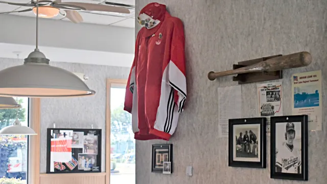 Tony's Restaurant Hancock Sports Hall of Fame memorabilia. Red Jersey and Baseball Bat.