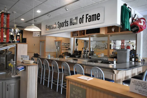 Tony's Restaurant Bar area with Hancock Sports Hall of Fame memorabilia.