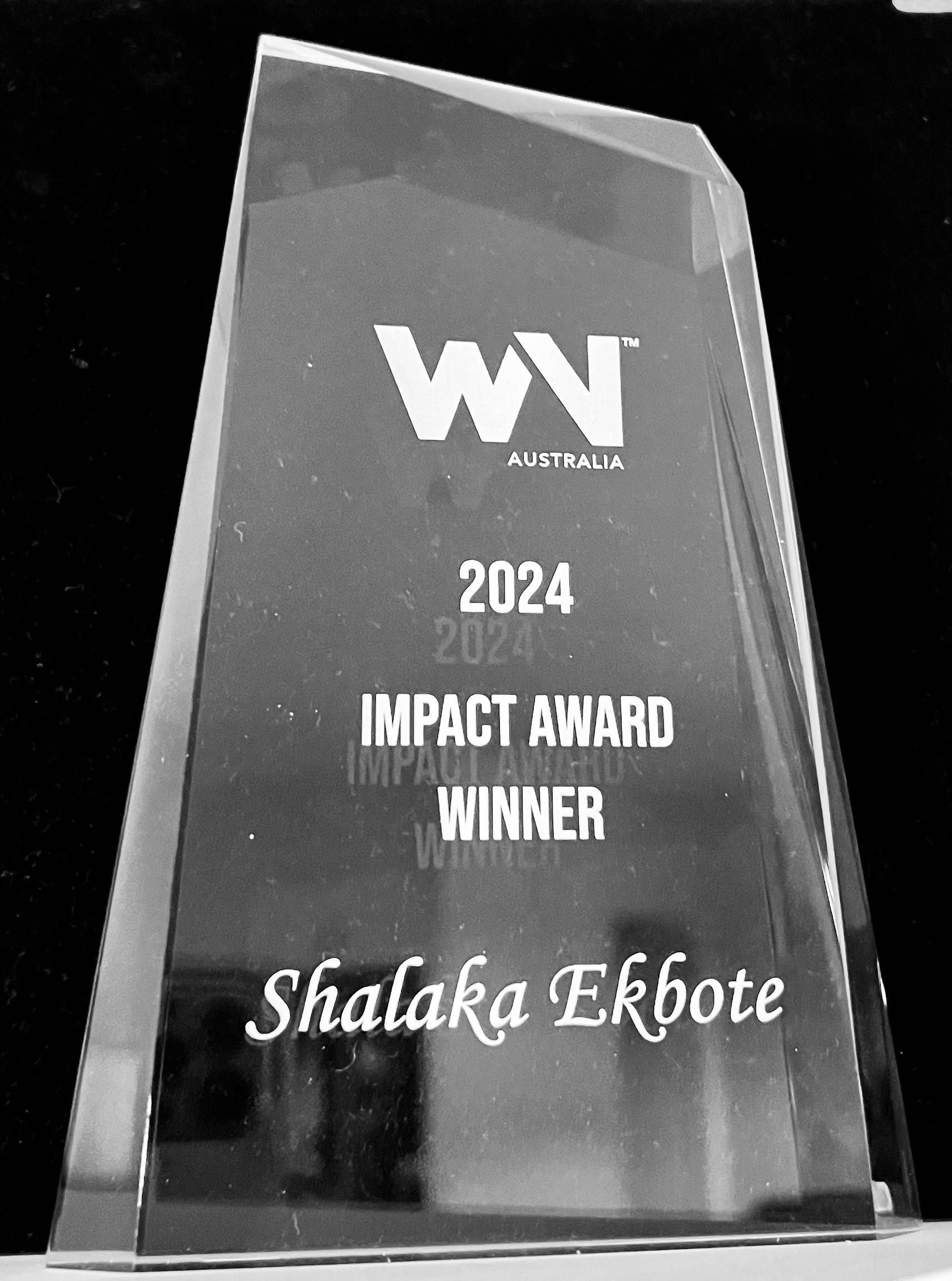 2024 WV Australia Impact Award Winner trophy awarded to Shalaka Ekbote.