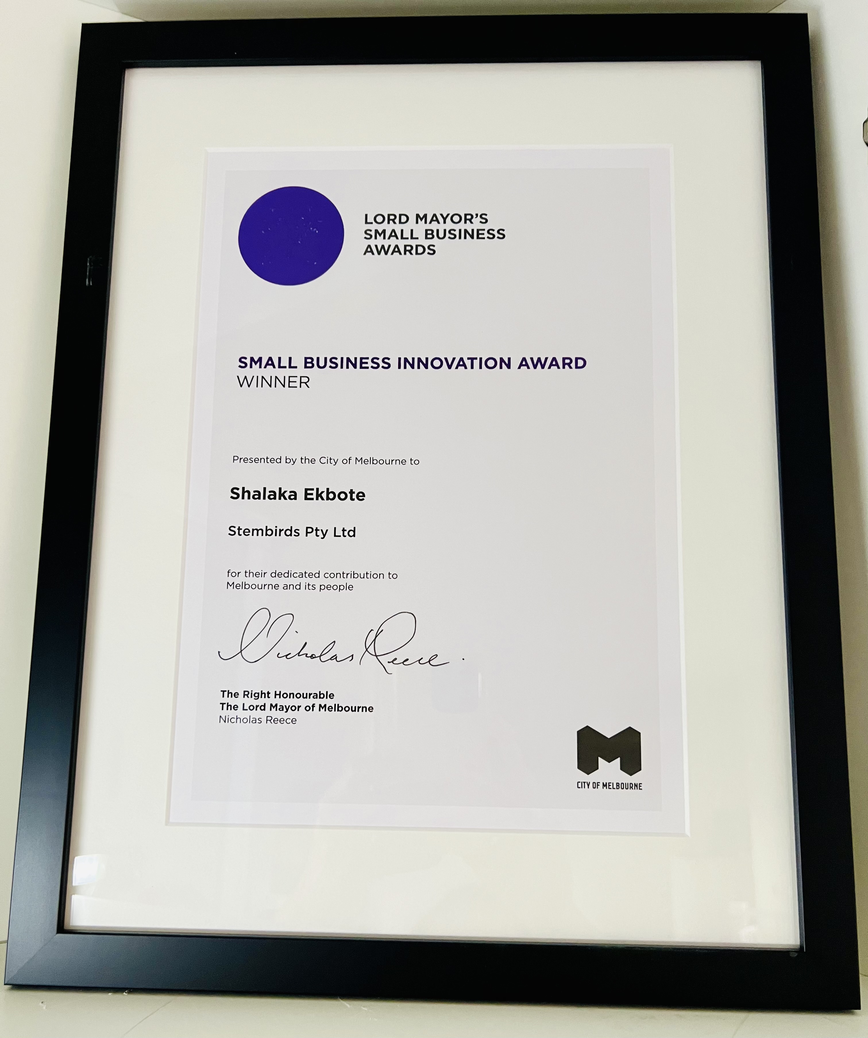 Framed Lord Mayor’s Small Business Awards certificate for Small Business Innovation Award won by Shalaka Ekbote of Stembirds Pty Ltd, signed by Nicholas Reece.
