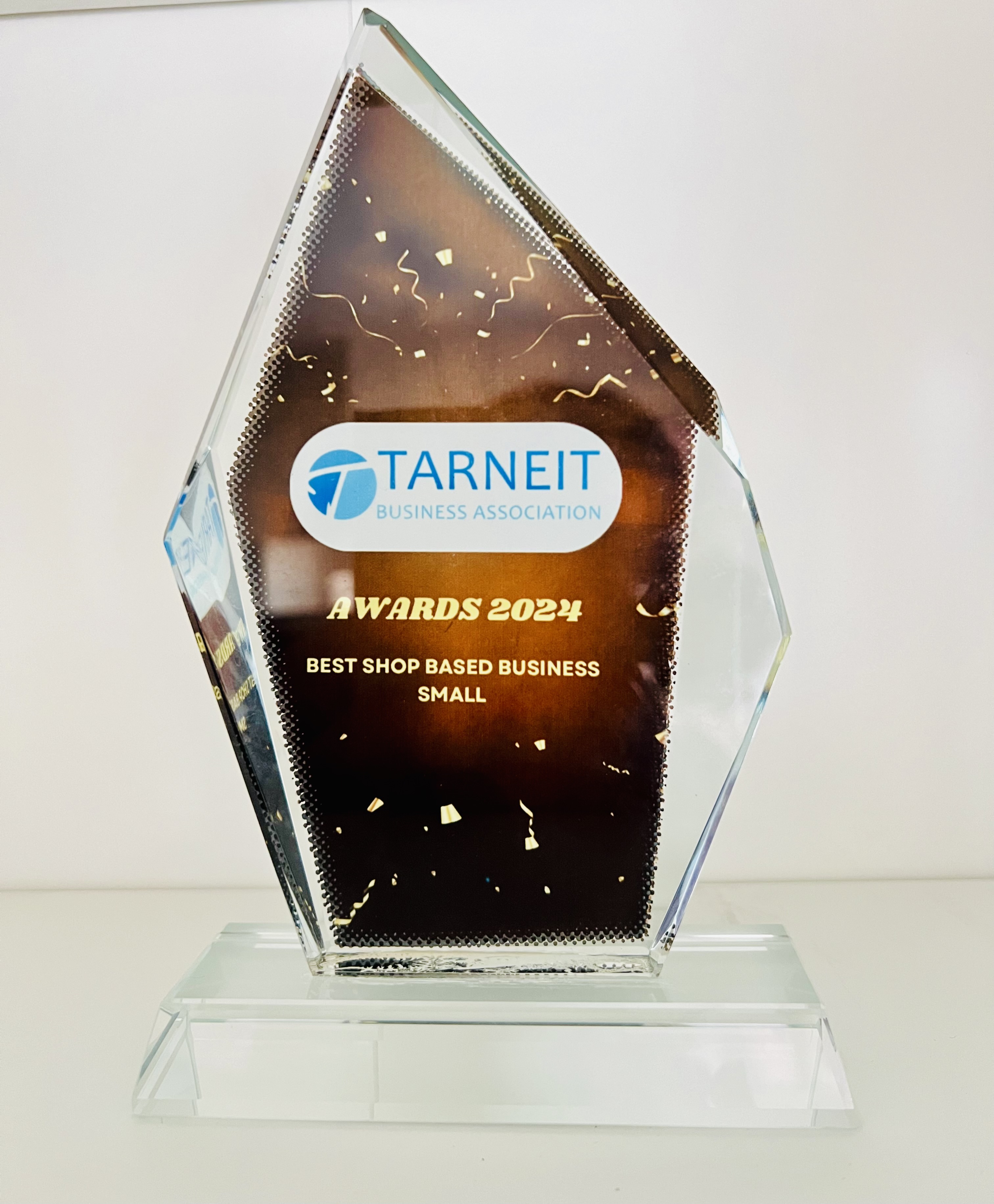 Crystal award trophy from Tarneit Business Association for Best Shop Based Small Business 2024.