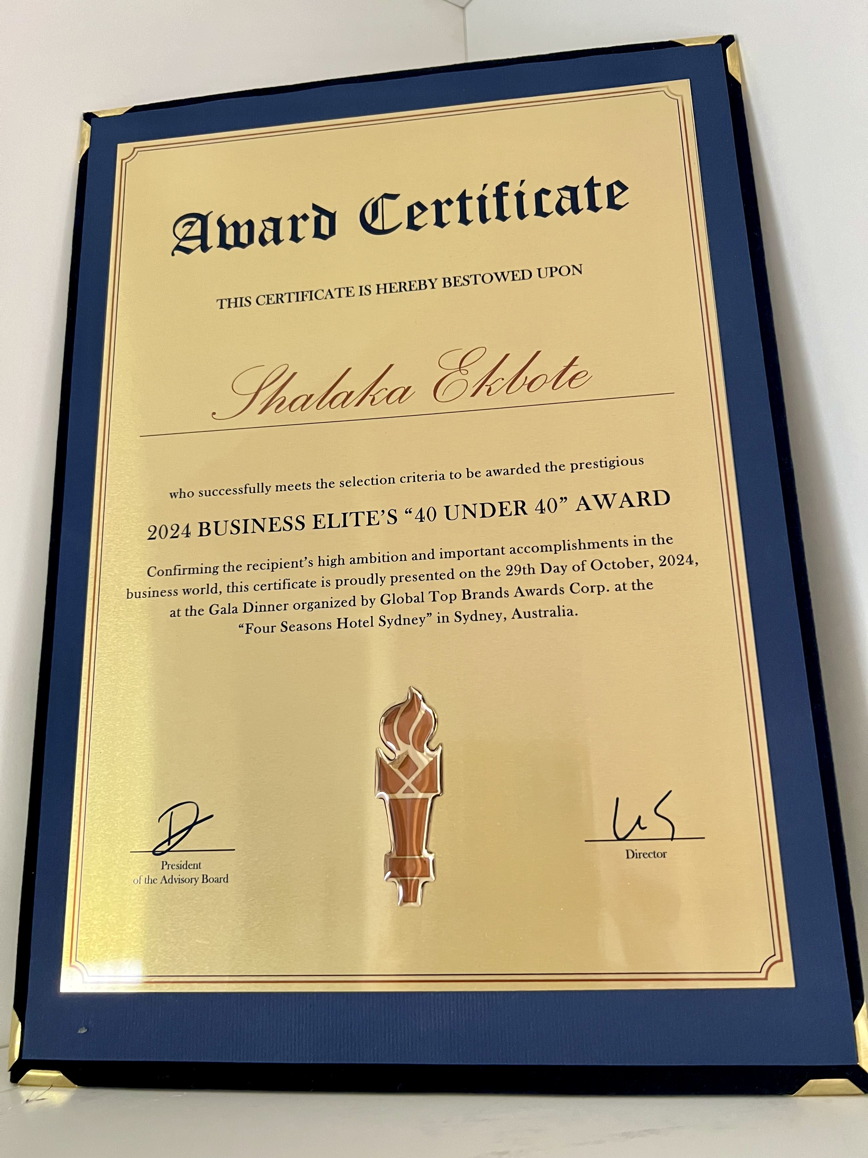 Award certificate presented to Shalaka Ekbote for 2024 Business Elite’s 40 Under 40 Award, signed by President of the Advisory Board and Director.