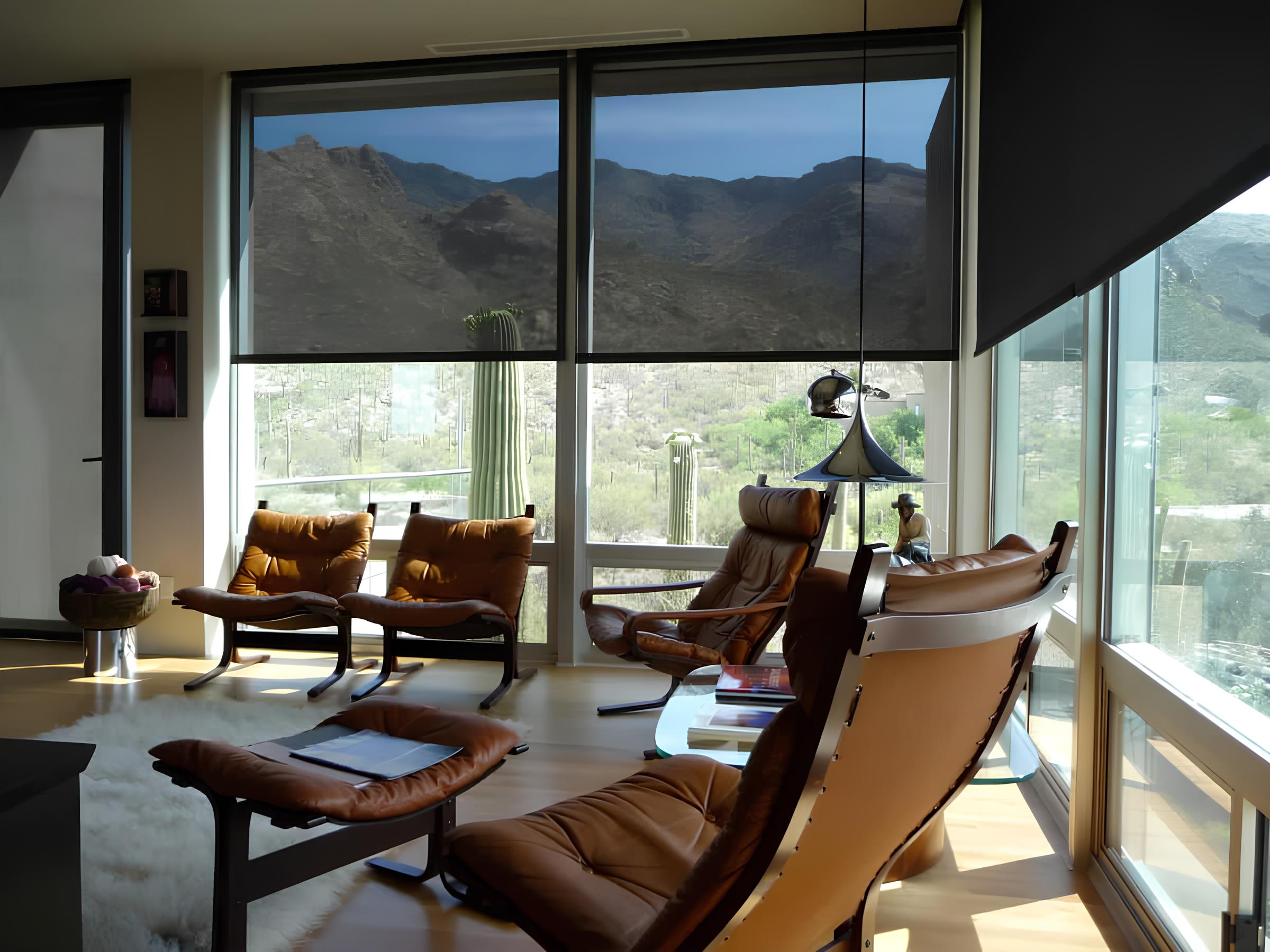 Partially closed solar screens in a living room