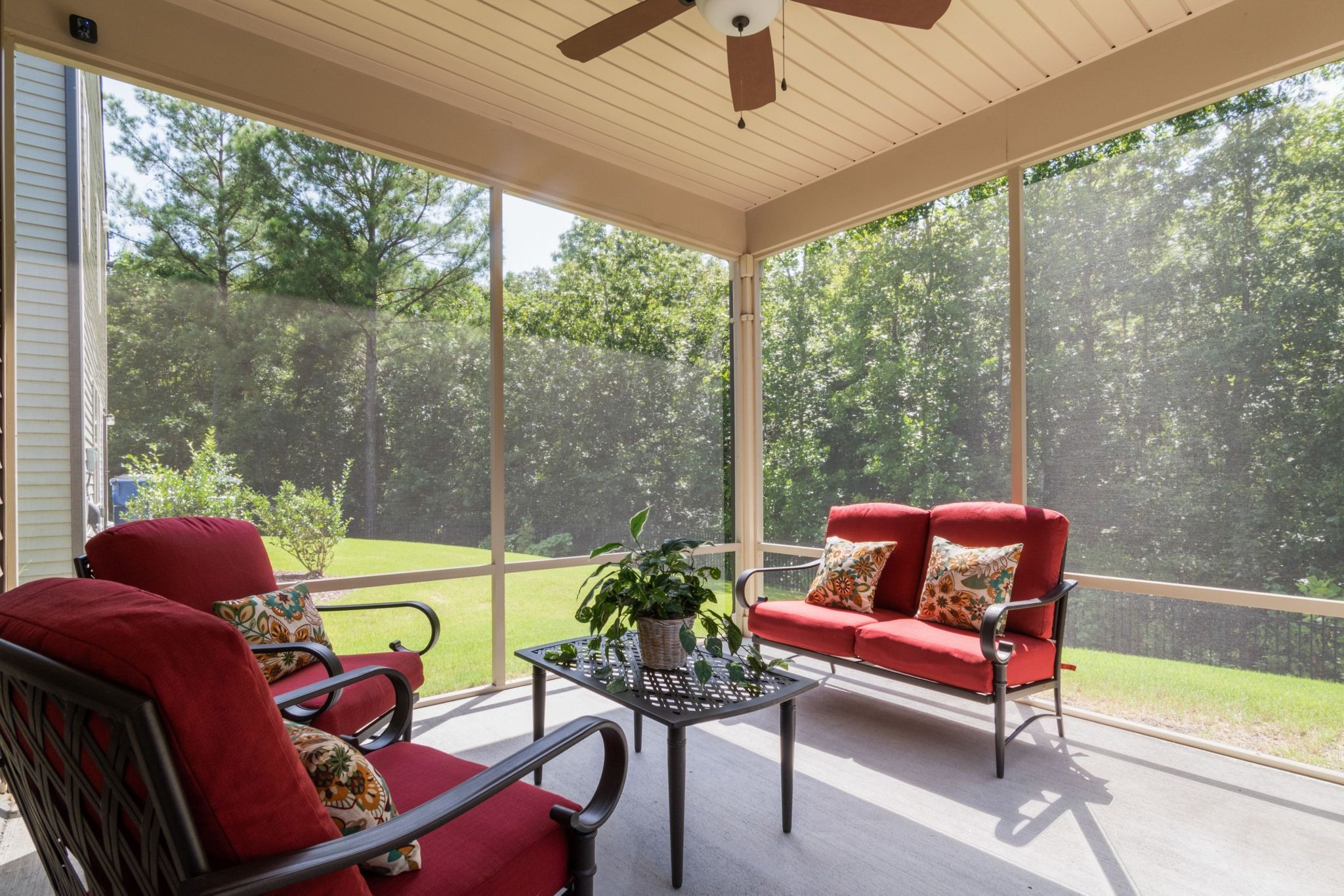 Screened patio allowing natural light and outdoor visibility