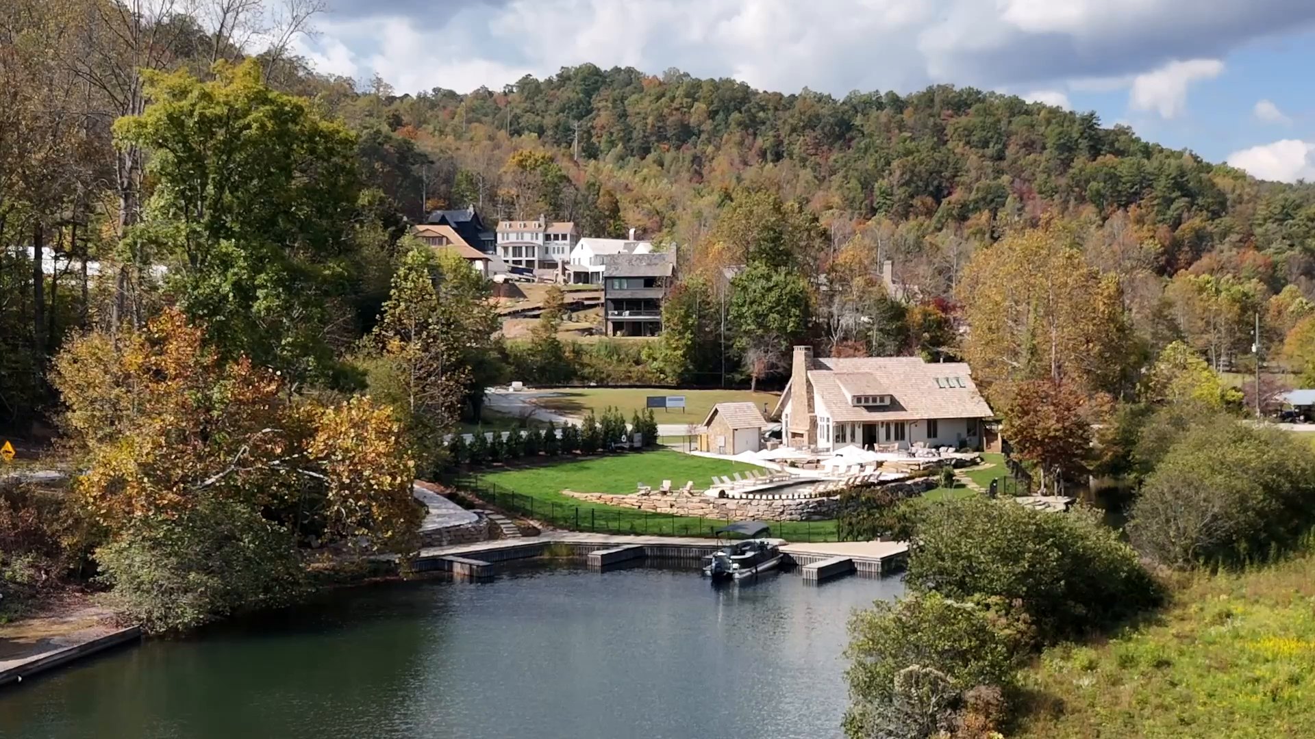 Aerial view of the Burton Boathouse and the lake in the fall