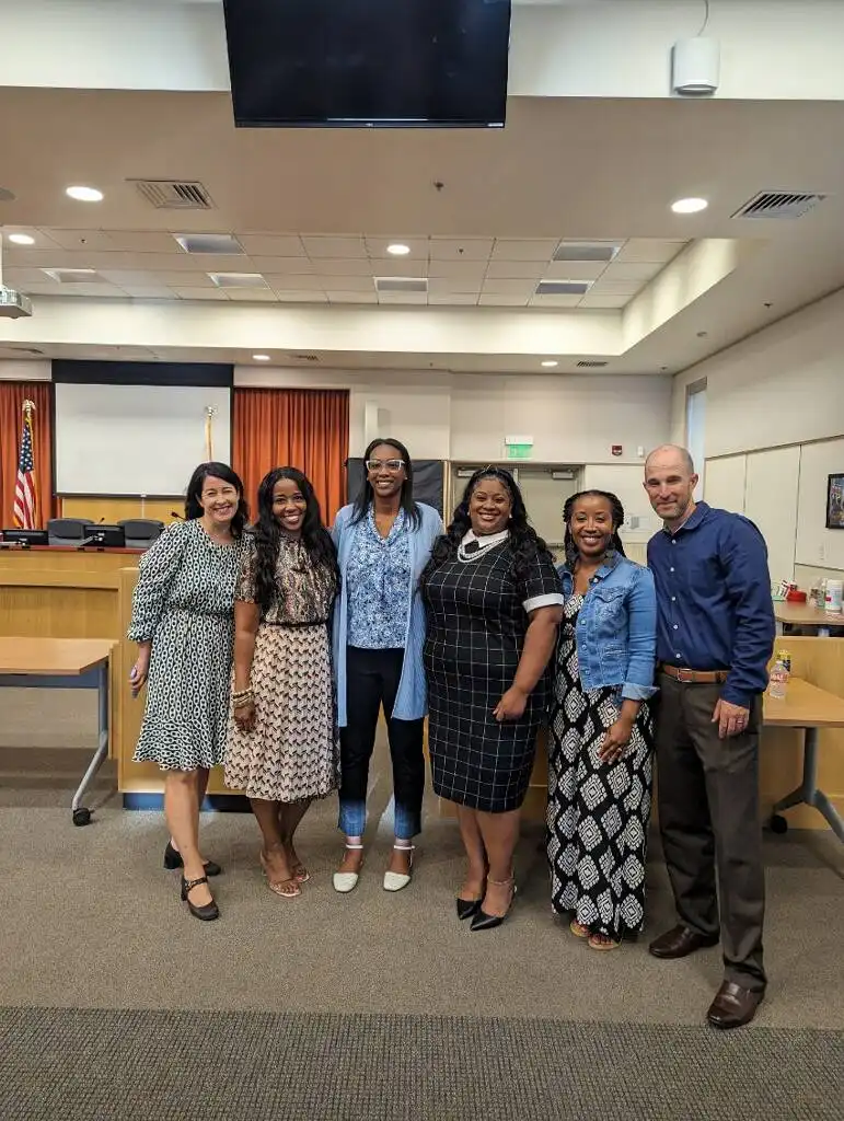 Group photo of educational justice advocates with the BUSD Reparations Coalition