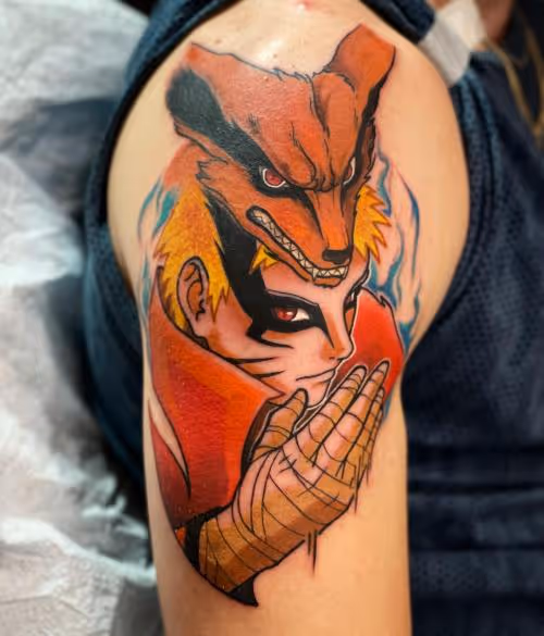 Colorful Naruto and Kurama tattoo on upper arm