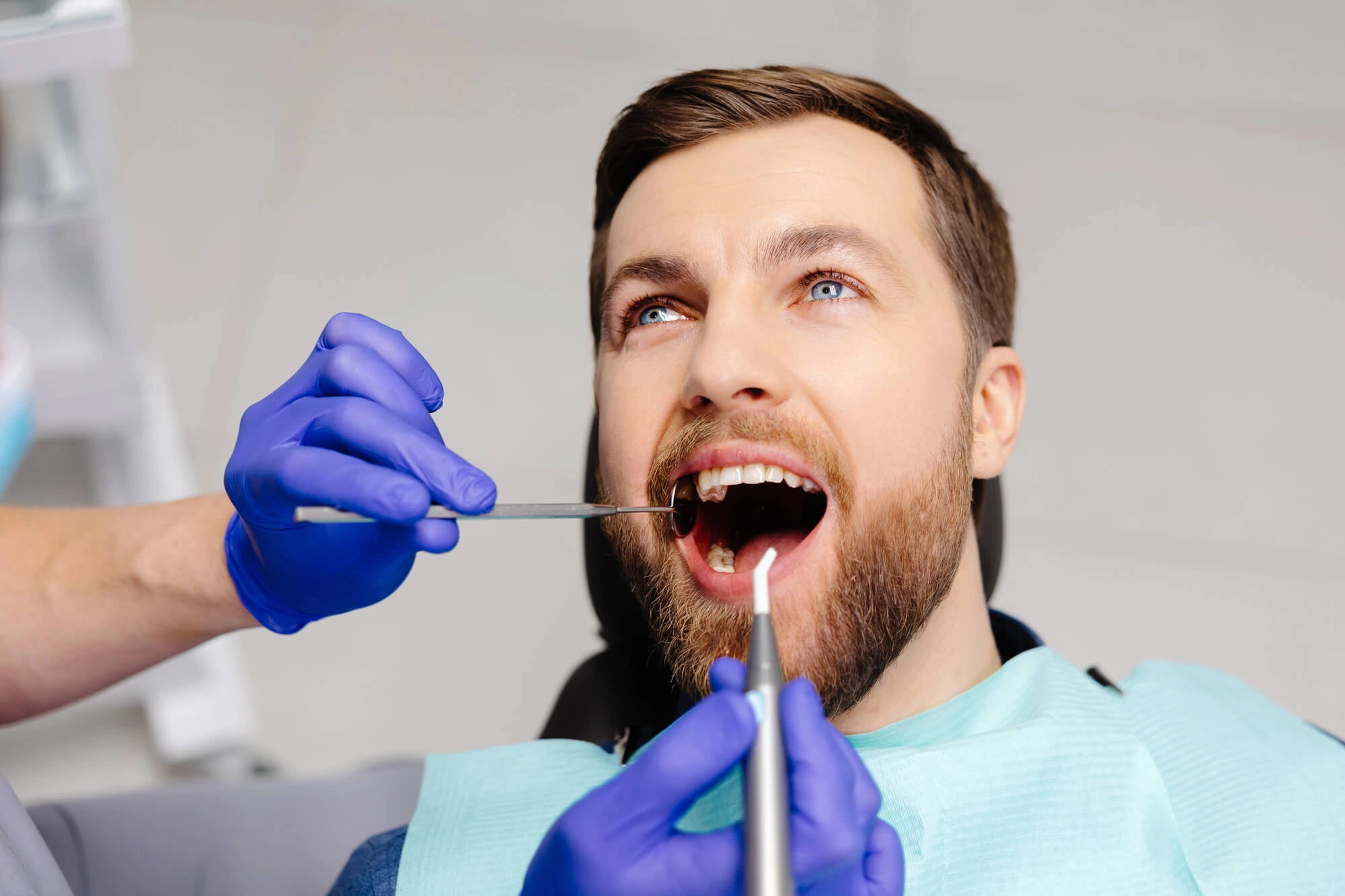 Dentist Columbia SC Examining Patient for Dental Caries Prevention