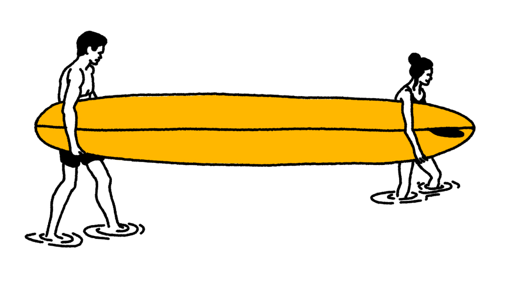 A man and a woman walking in shallow water while carrying a large yellow surfboard together.