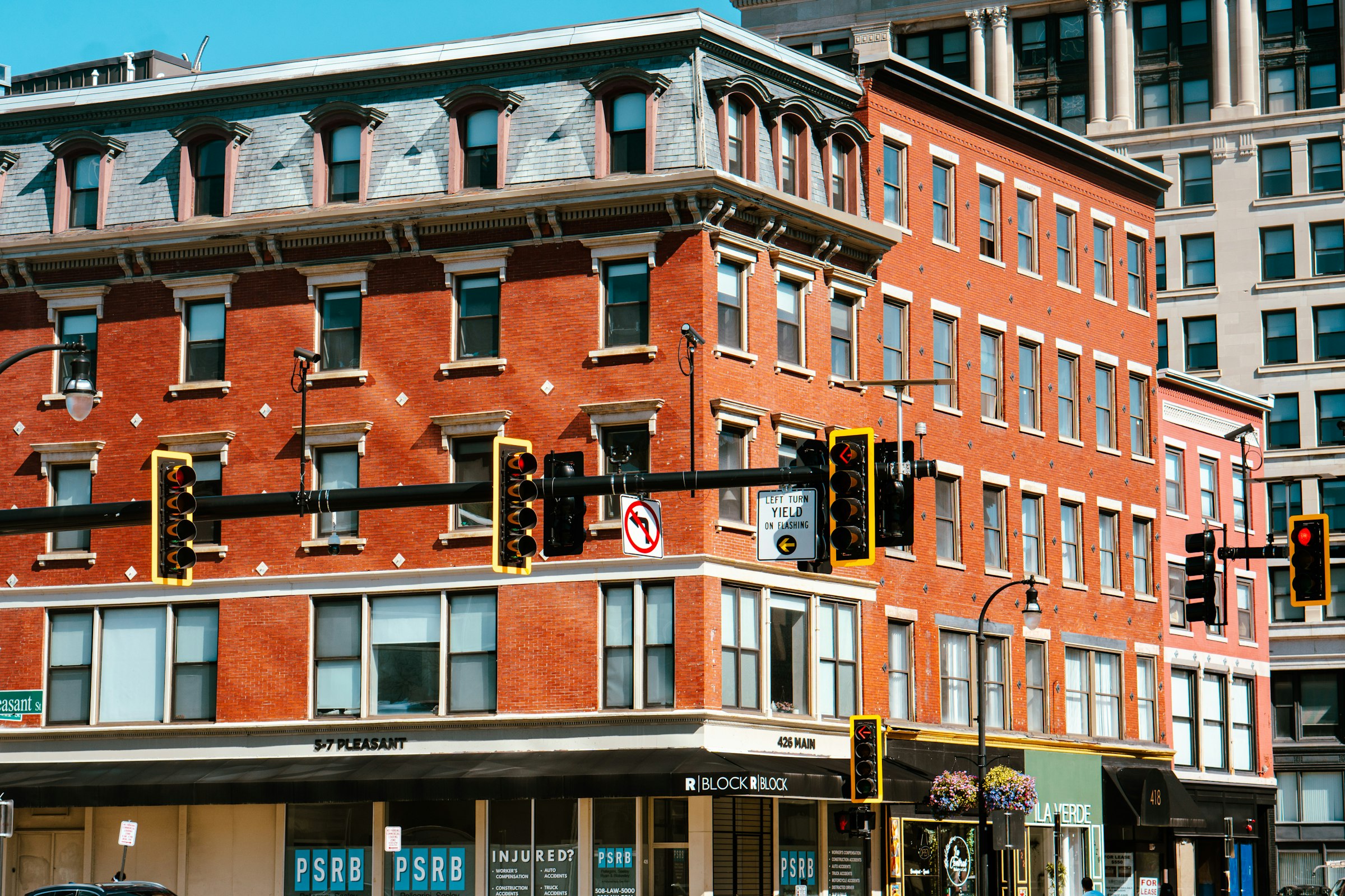 Red brick buildings along a downtown street in Worcester, Massachusetts