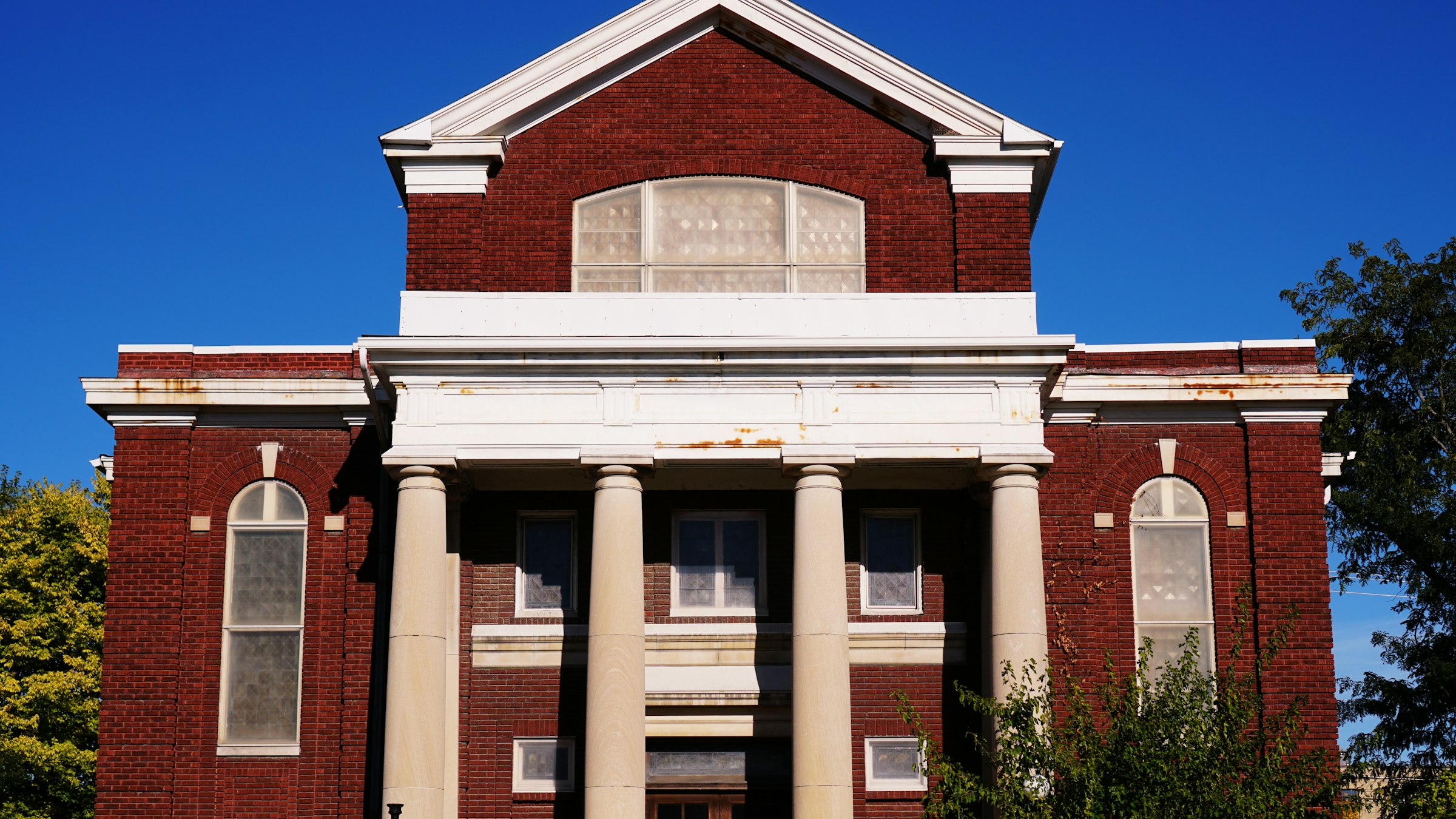 Historic brick building with columns in Cedar Rapids, Iowa