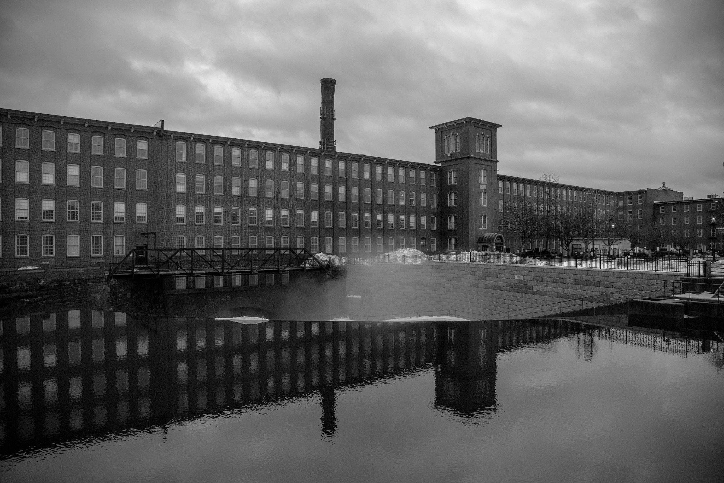 Historic New England mill building and dam