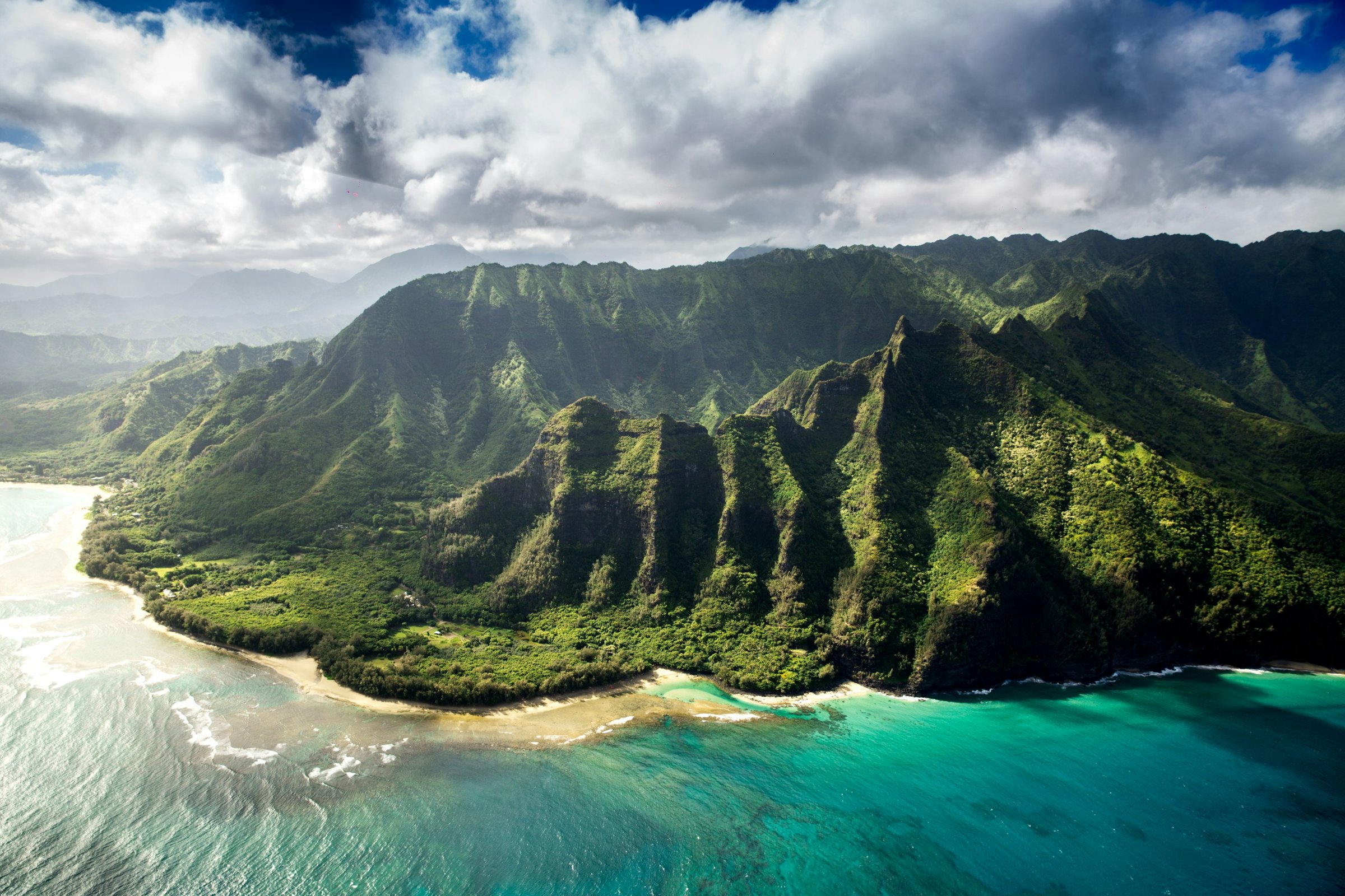 Aerial view of the green cliffs of the Na Pali Coast on Kauai, Hawaii