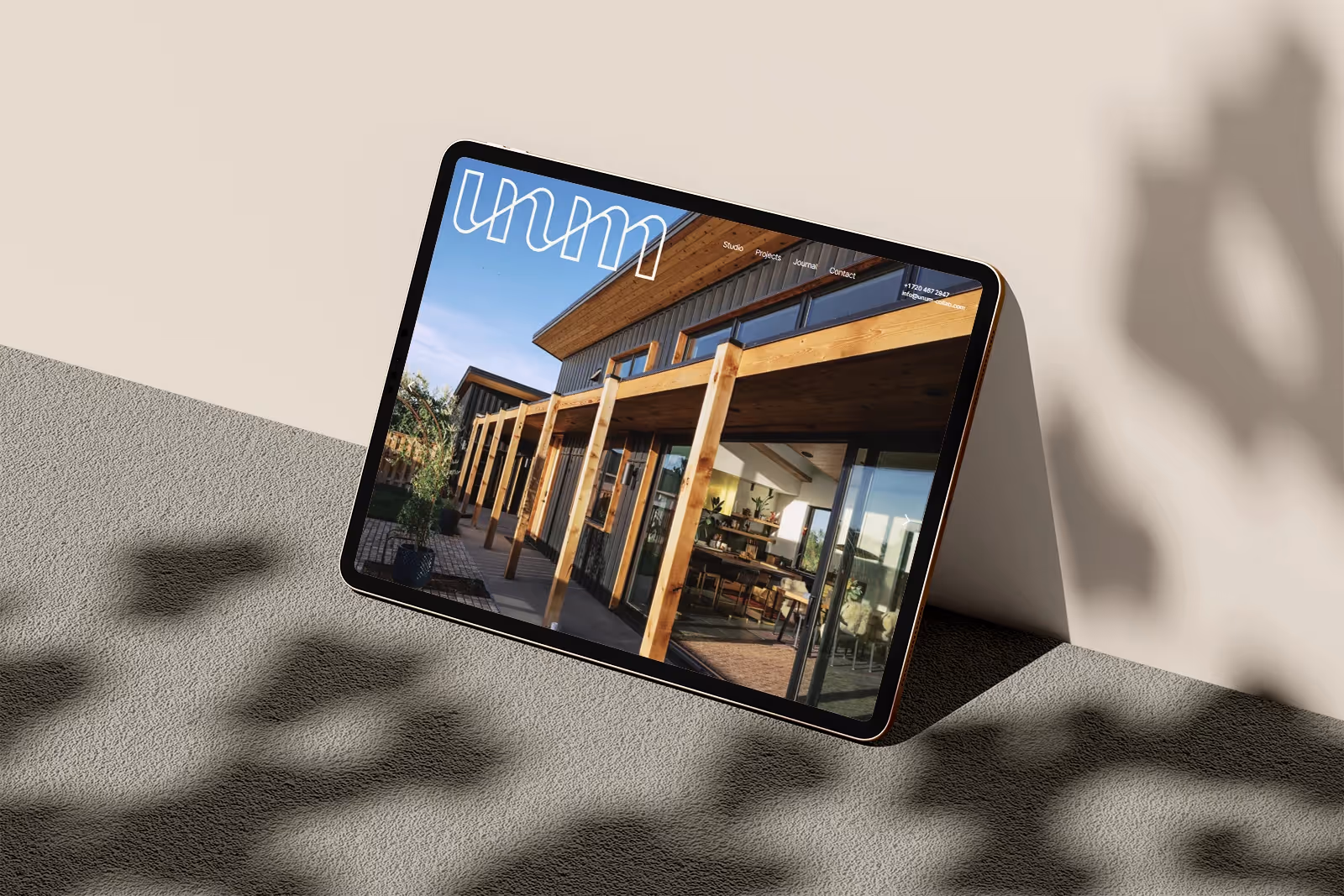 Mockup of UNUM's website on an iPad