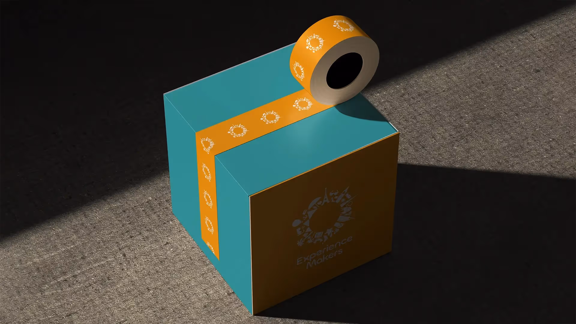 Mockup showing a gift box being sealed with Experience Makers Tourism's logo on the tape and box