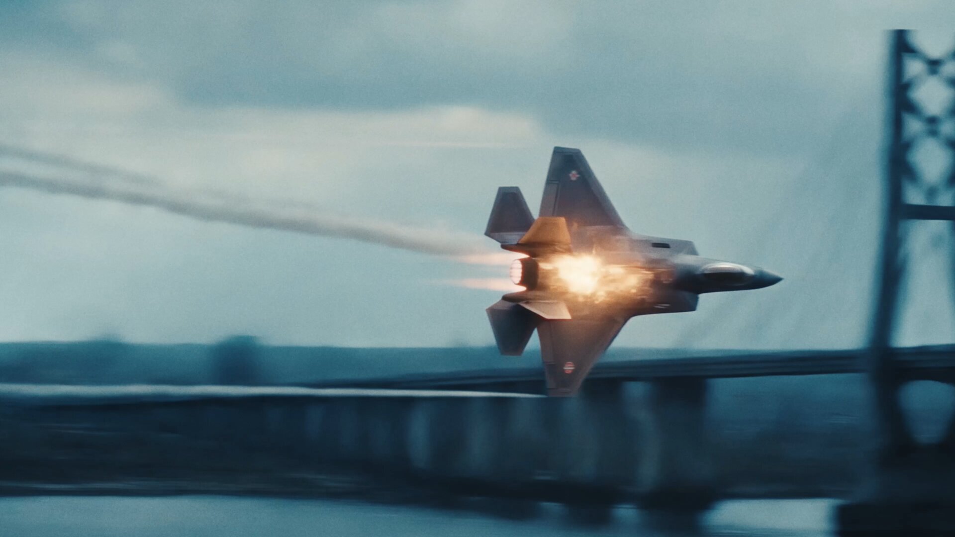 Fighter jet firing over a bridge in Before Us