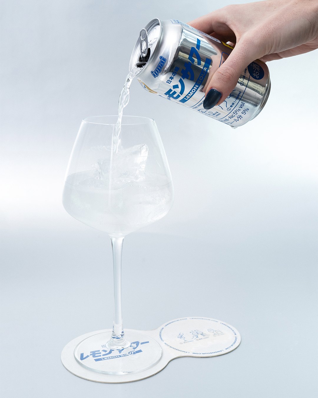 Lemon Sour poured over ice into a wine glass