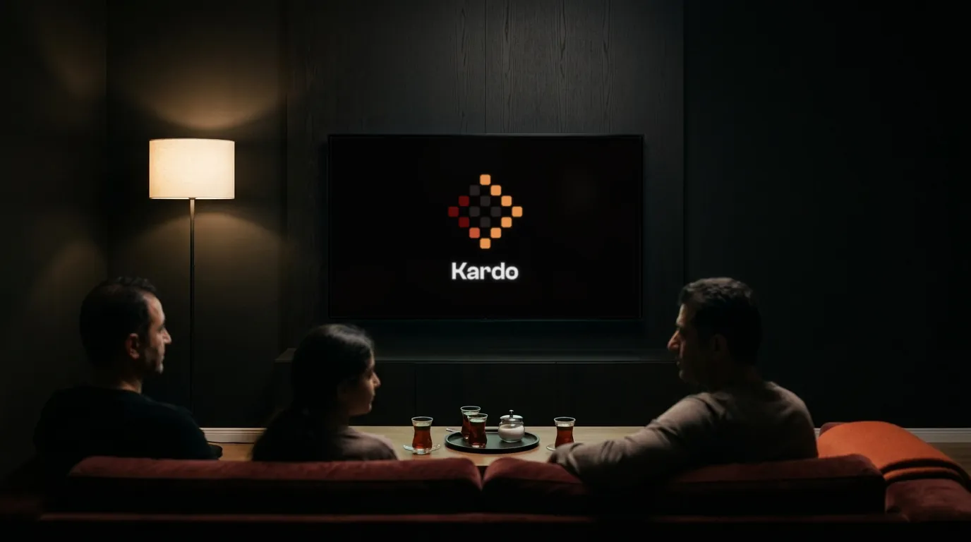 The KardoTV mark glows on a television in a dark living room while a family watches