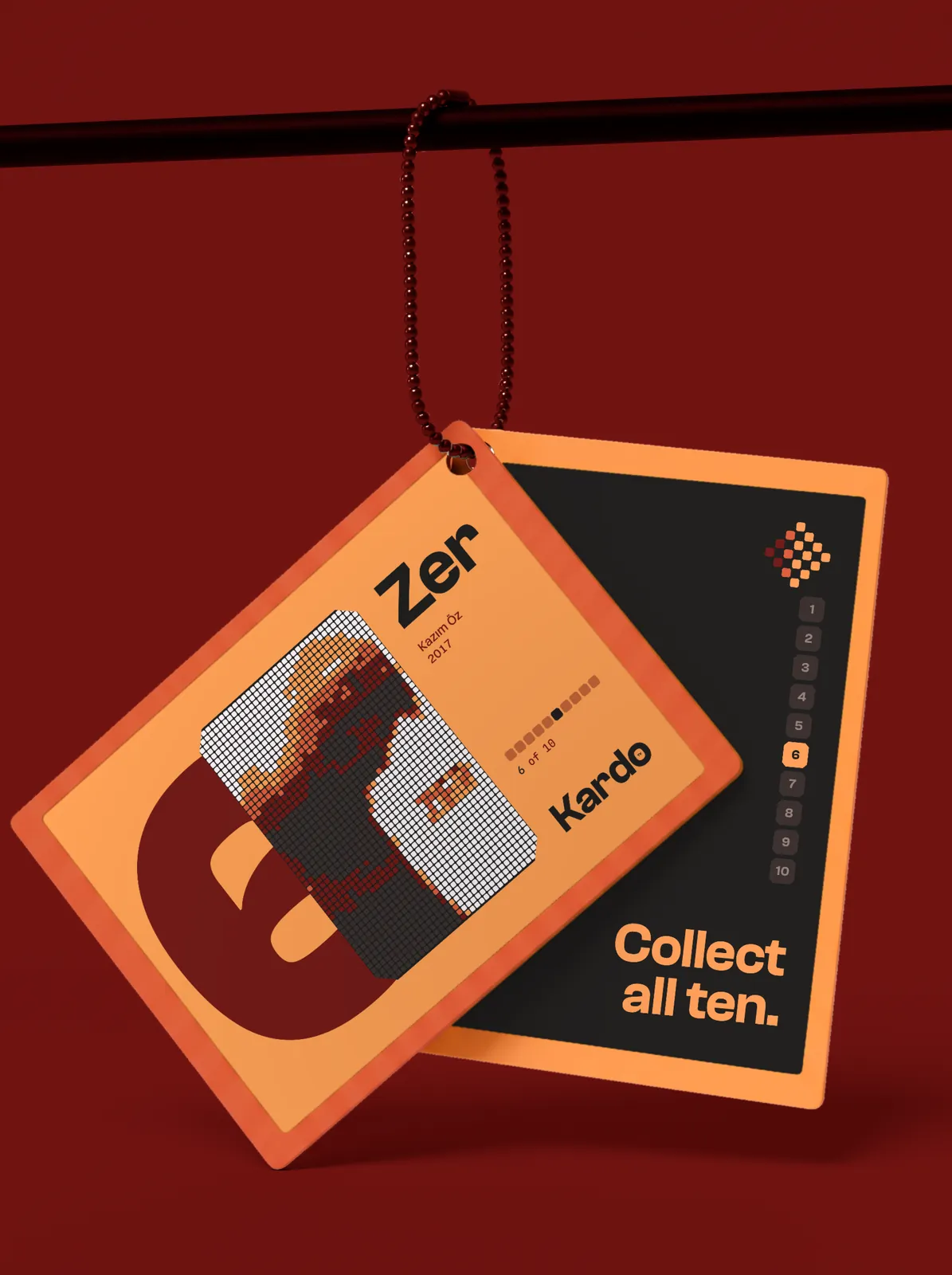 Two Kardo collectible tags on a cord against deep red: Collect all ten