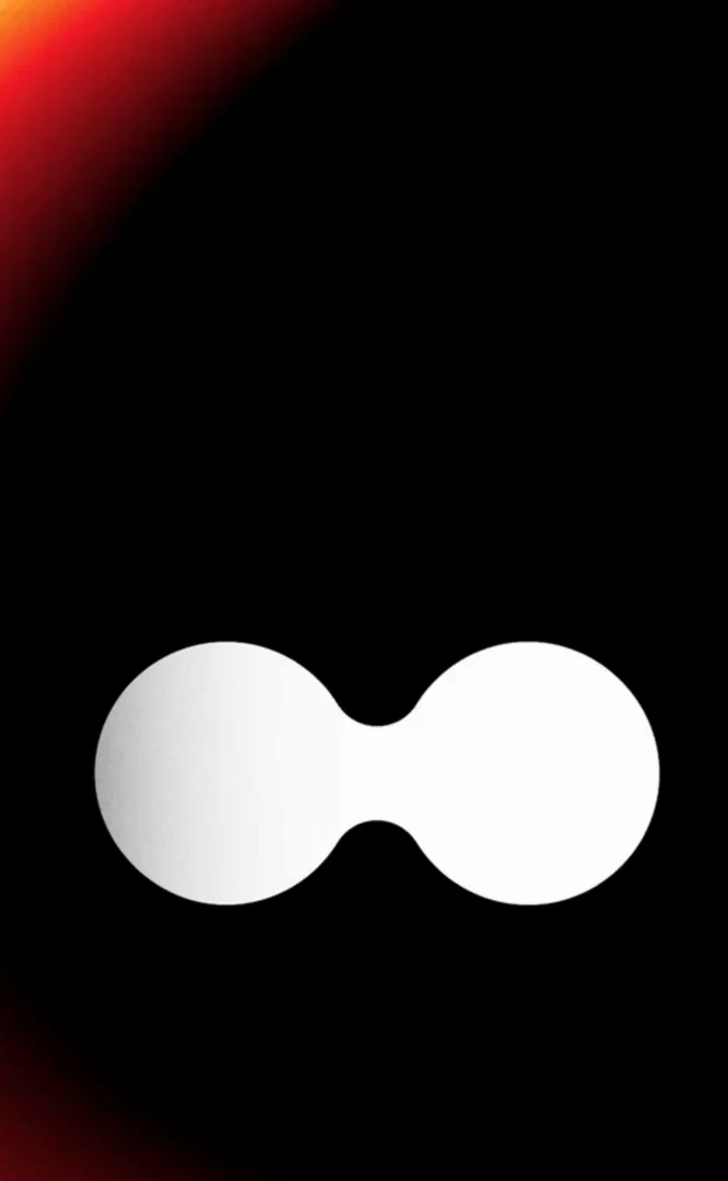 The iklipse emblem in white inside an orange eclipse ring, the last frame of the Custom Tools film