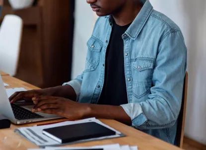 Man working on his laptop at the office