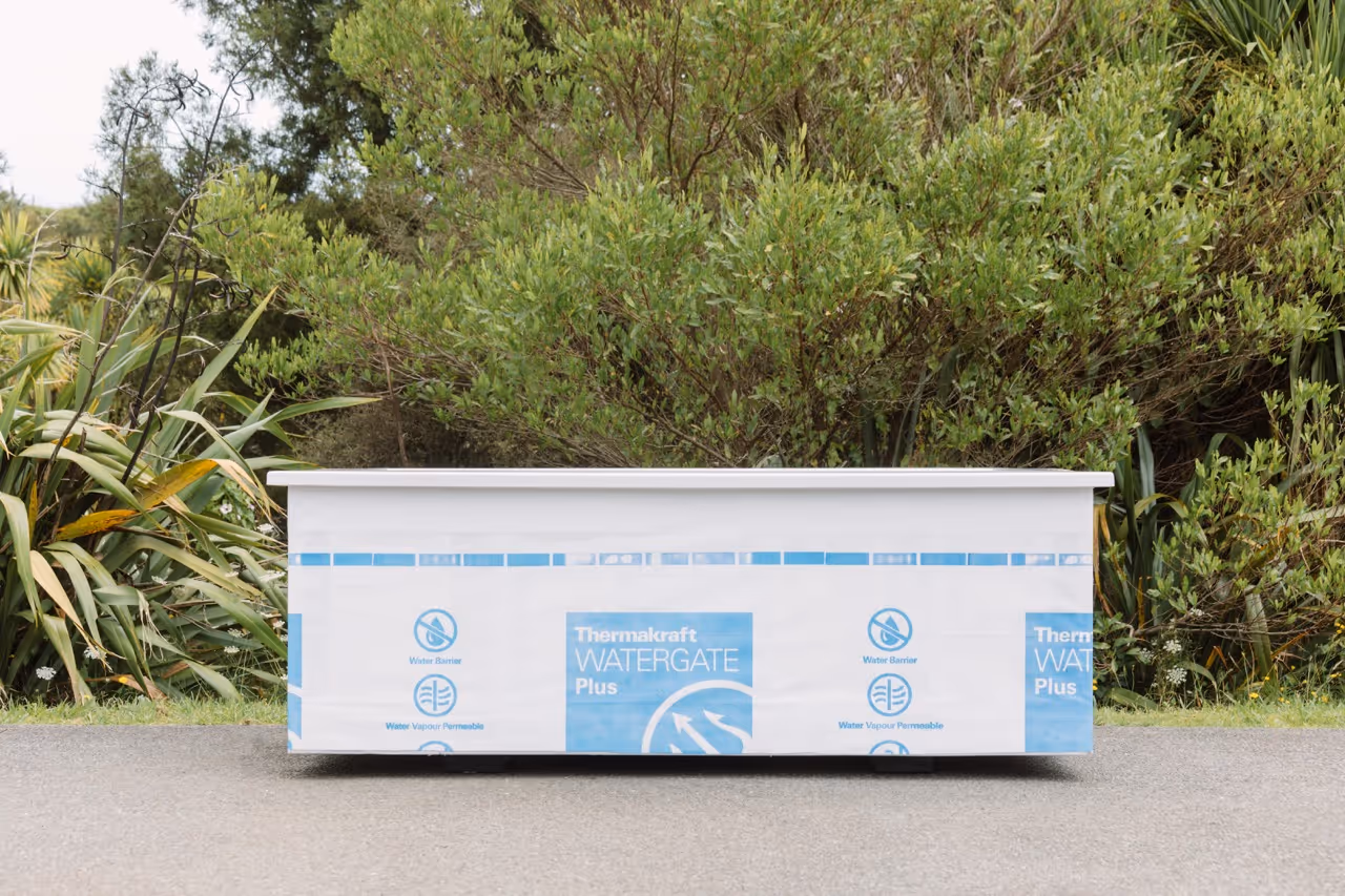 Star Baths Bare outdoor bath wrapped in Thermakraft building wrap, ready for custom cladding, Raglan New Zealand