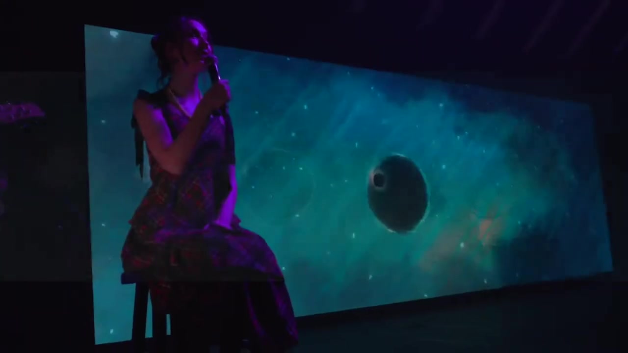 Finished animation playing behind a live performer